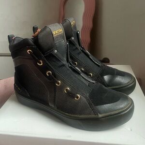 Stylish Black Ankle Boots with Gold Accents